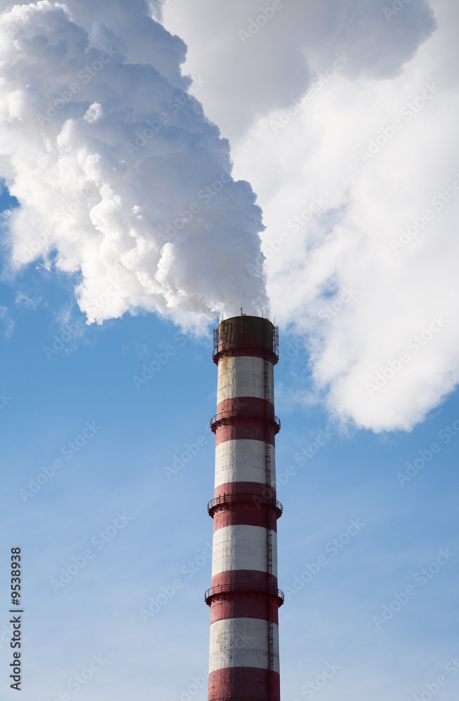 Smoke billowing from tall stacks Smoke billowing from tall stacks