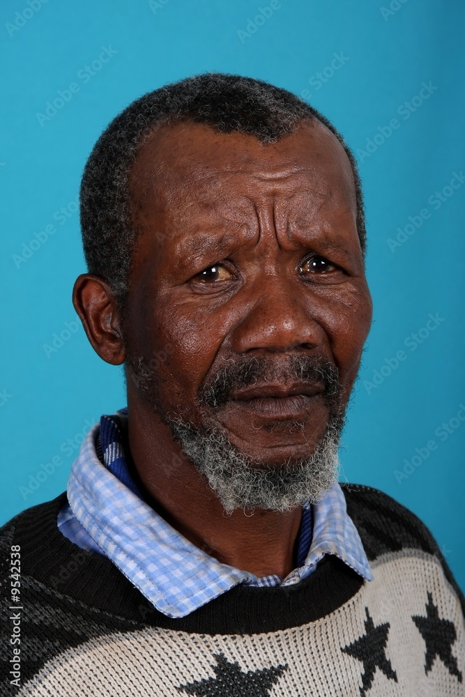 Senior African man with beard and sad expression Senior African man with beard and sad expression