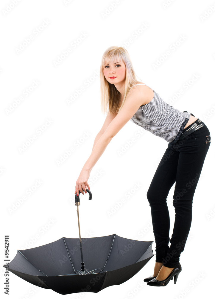Young woman holding an open black umbrellla Young woman holding an open black umbrellla