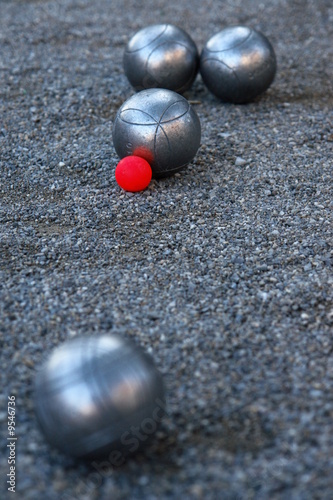 silver boccia ball on the ground photo