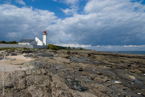 Beautiful lighthouse taken from the rocks photo