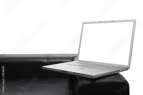 Laptop on couch isolated with clipping paths