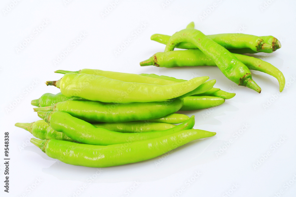 a bunch of green pepper isolated on white background. a bunch of green pepper isolated on white background.