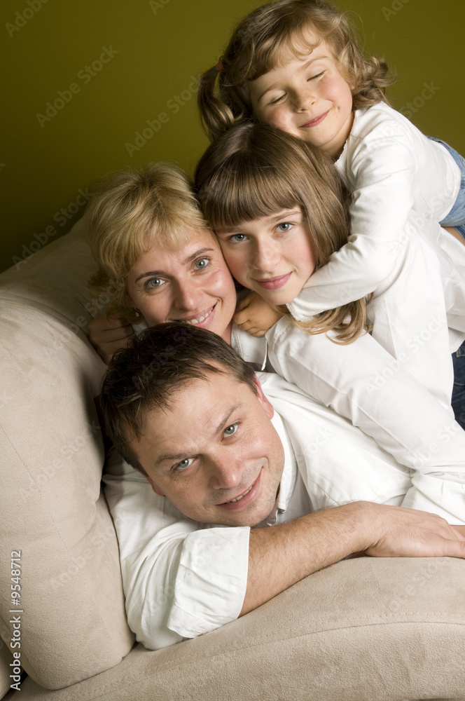 Happy family on sofa