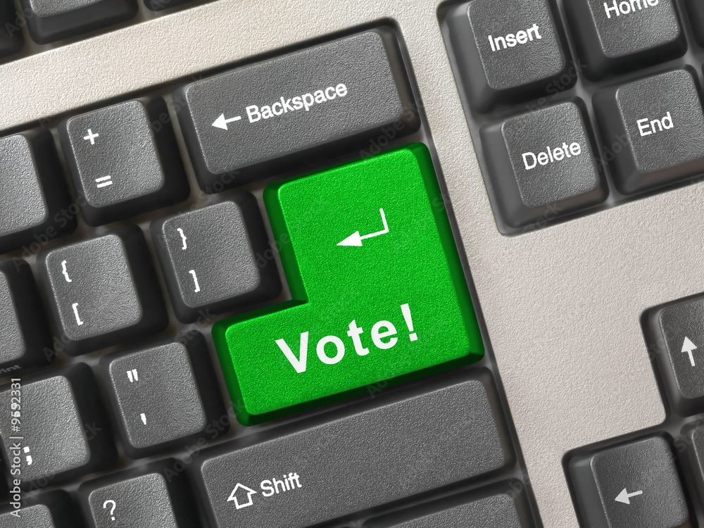Computer keyboard with vote key, business concept Computer keyboard with vote key, business concept