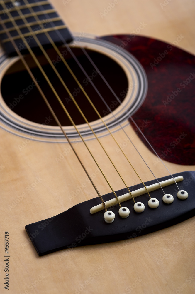 Fototapeta premium A 6-string acoustic guitar background