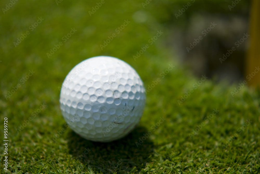 Golf club view of Golf ball in the putting green - sport Golf club view of Golf ball in the putting green - sport