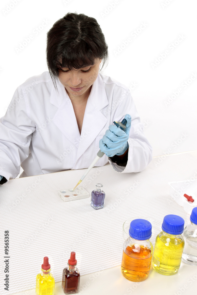 Looking down on a laboratory worker doing research Looking down on a laboratory worker doing research