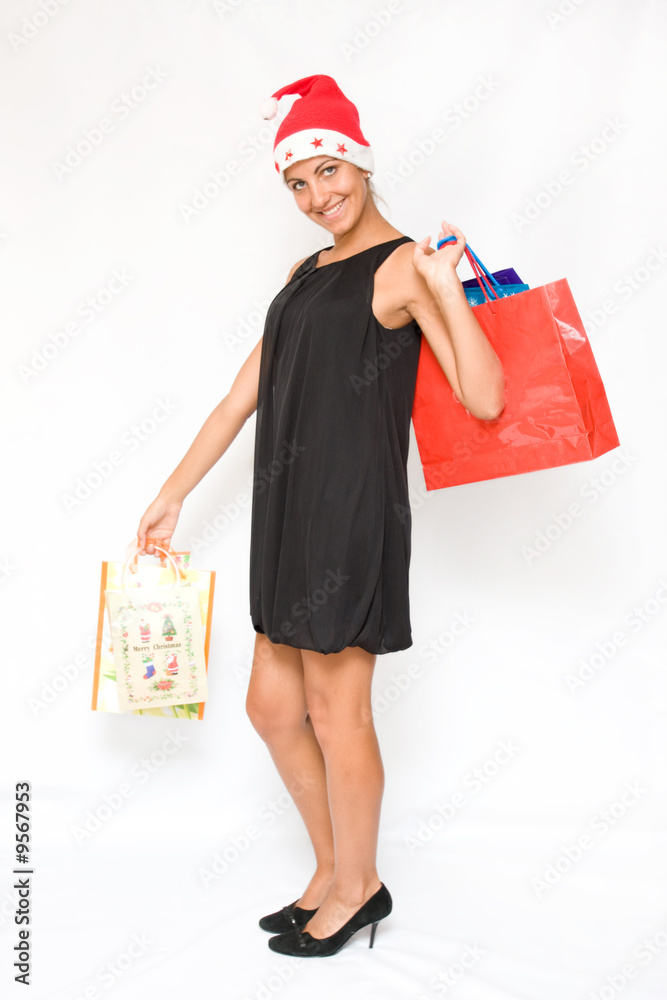 Happy Santa girl holding many gift boxes Happy Santa girl holding many gift boxes