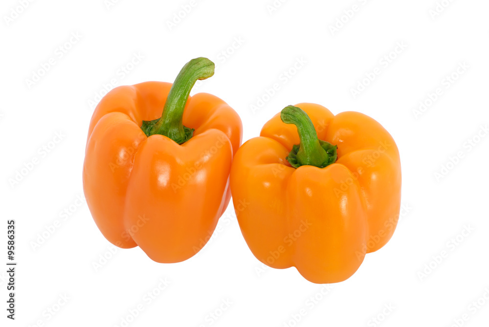 Two orange peppers isolated on white Two orange peppers isolated on white