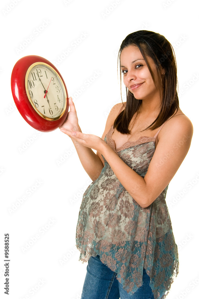Pregnant Hispanic woman anxiously awaits the birth of her baby. Pregnant Hispanic woman anxiously awaits the birth of her baby.