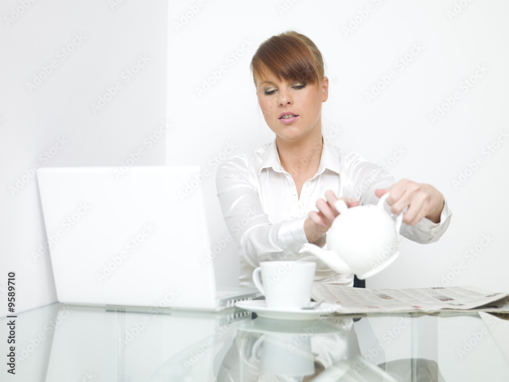 Business woman is working and drinking coffee Business woman is working and drinking coffee