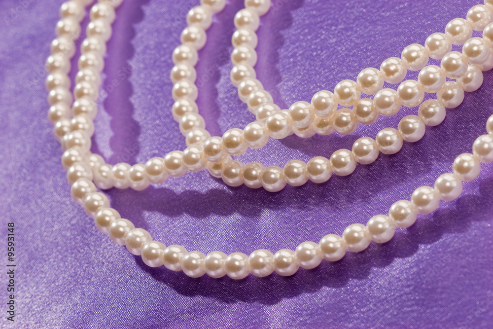 Beads of pearl on the lilac for lady Beads of pearl on the lilac for lady
