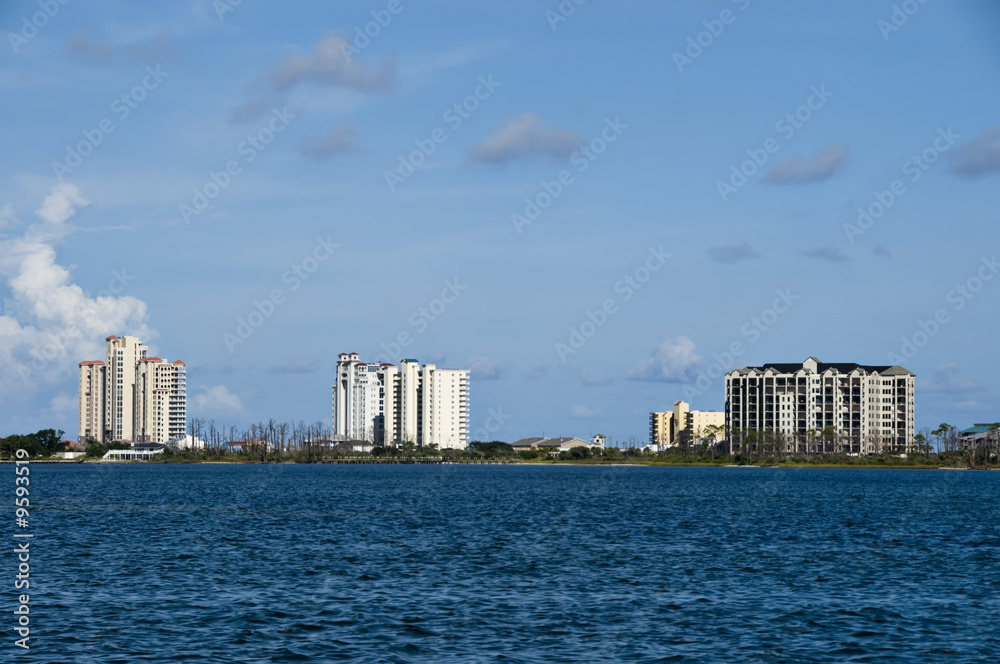 View of a series of high rise condos by the sea