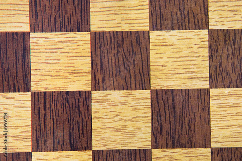 Macro picture of chessboard for wallpaper brown .
