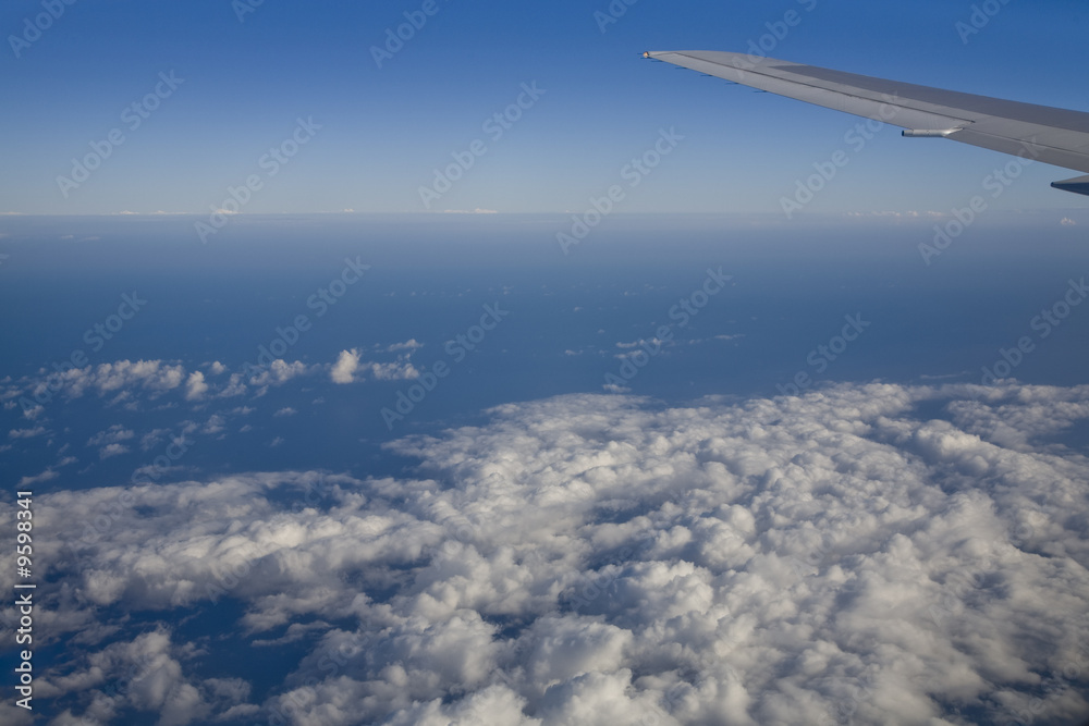 Ocean outside a jumbo jet plane window Ocean outside a jumbo jet plane window