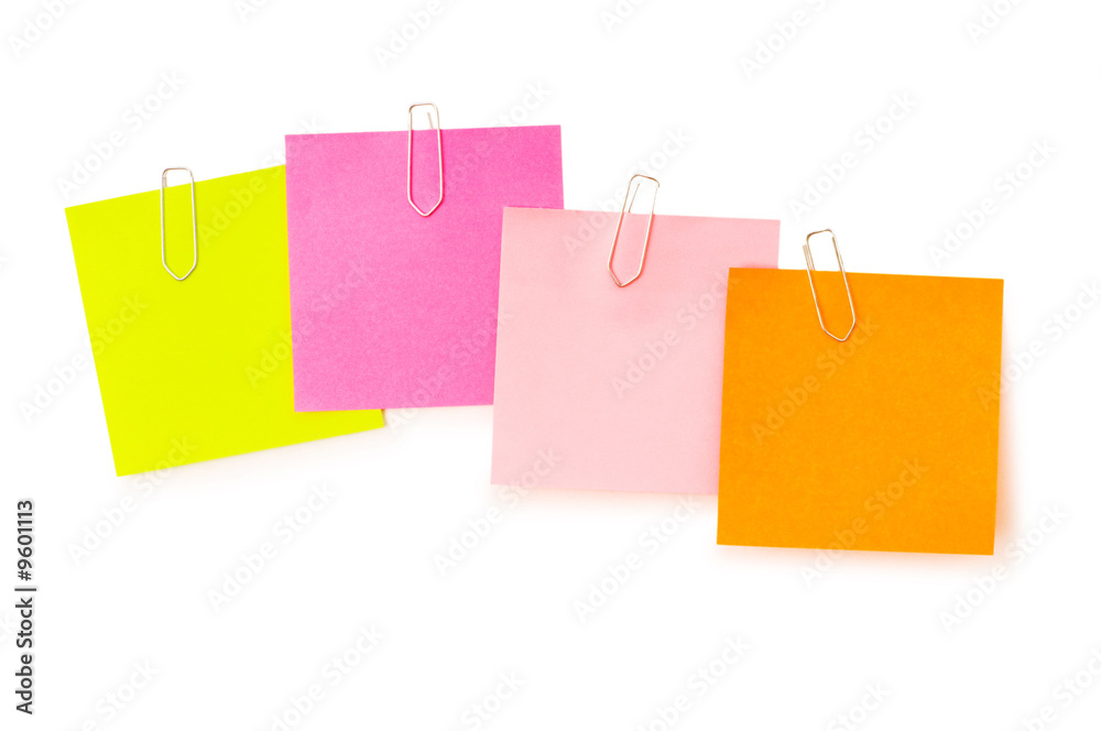 Reminder notes with paperclips isolated on the white Reminder notes with paperclips isolated on the white