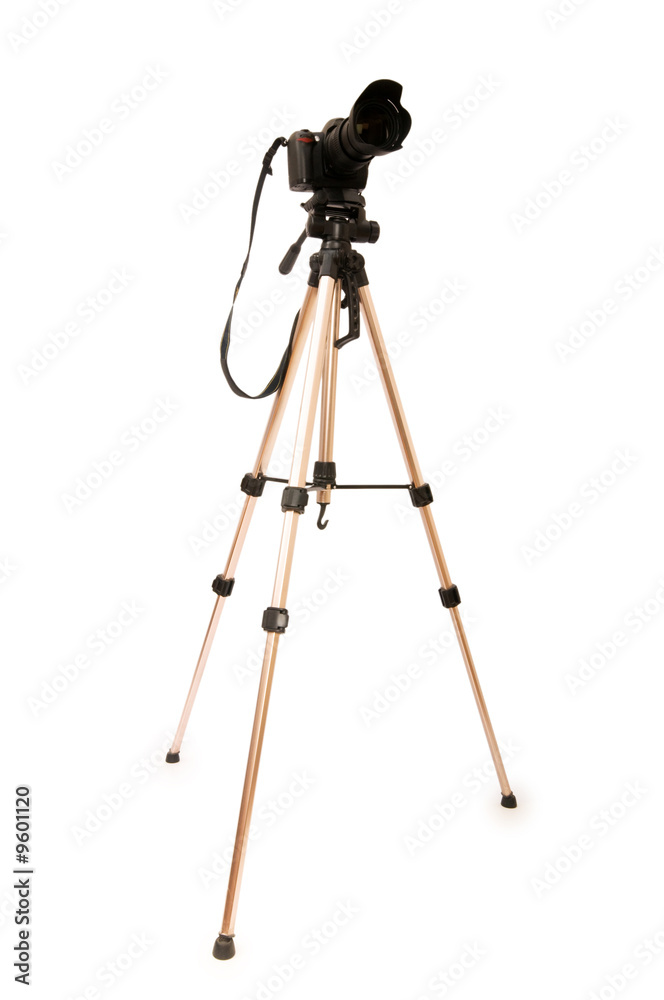 Tripod and camera isolated on the white background Tripod and camera isolated on the white background