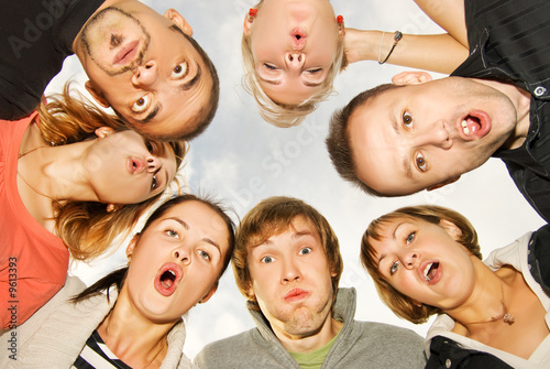 Принти на полотні Group of happy friends making surprised faces
