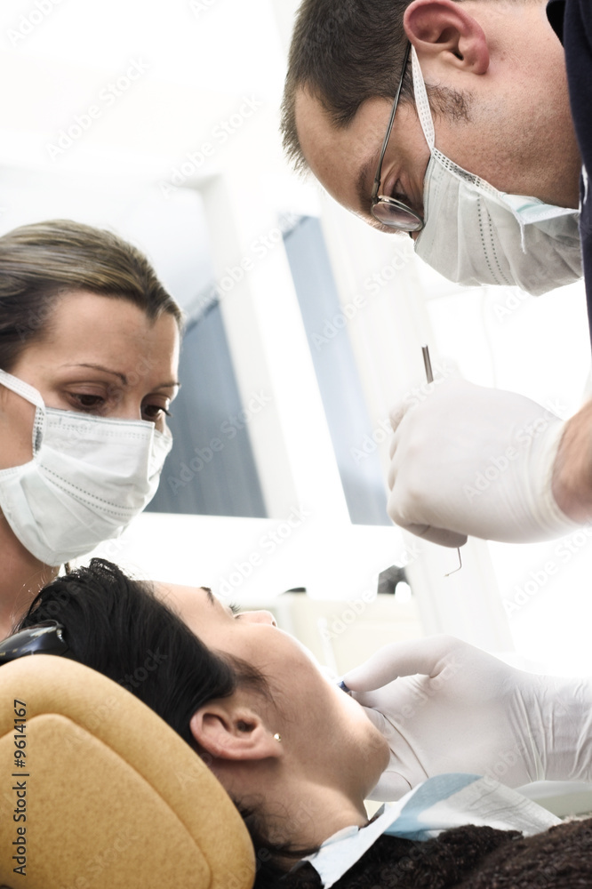 female patient takes a dental attendance
