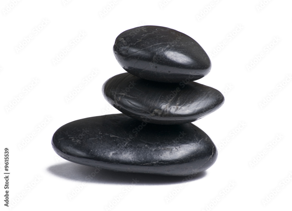 Three stacked stones isloated on white background Three stacked stones isloated on white background