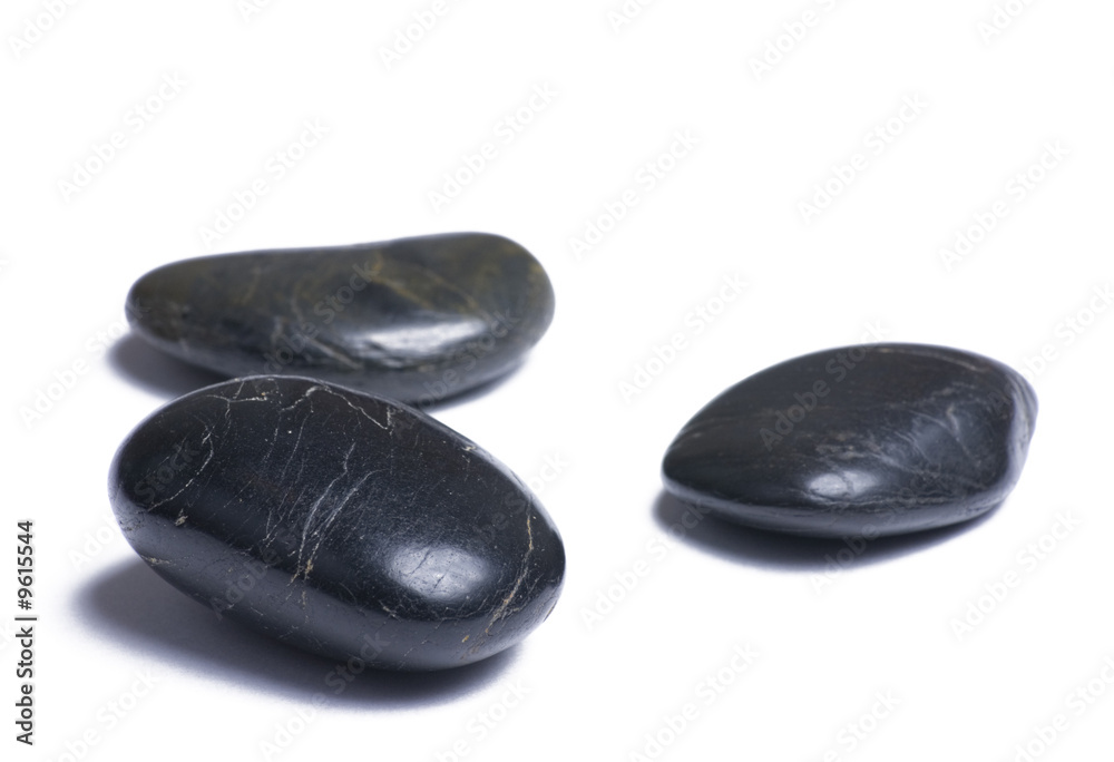 Black stones isloated on a white background Black stones isloated on a white background
