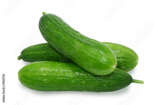 three cucumbers on white background