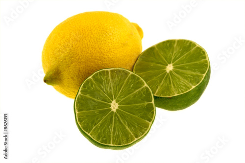 A yellow lemon and green lime isolated on a white background