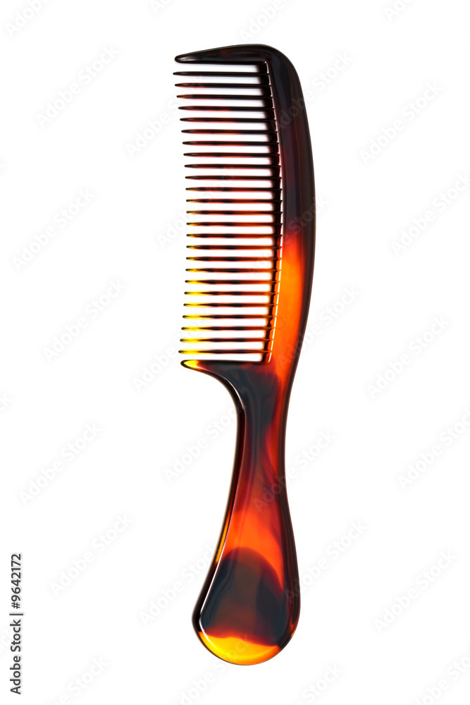 Beautiful plastic hairbrush on a white background Beautiful plastic hairbrush on a white background