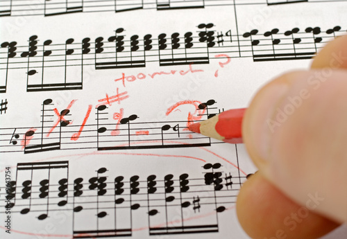 music notes composition on paper being written or marked