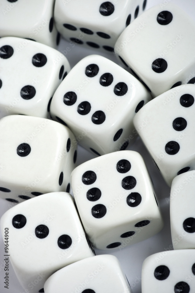White gambling dices thrown on white background White gambling dices thrown on white background