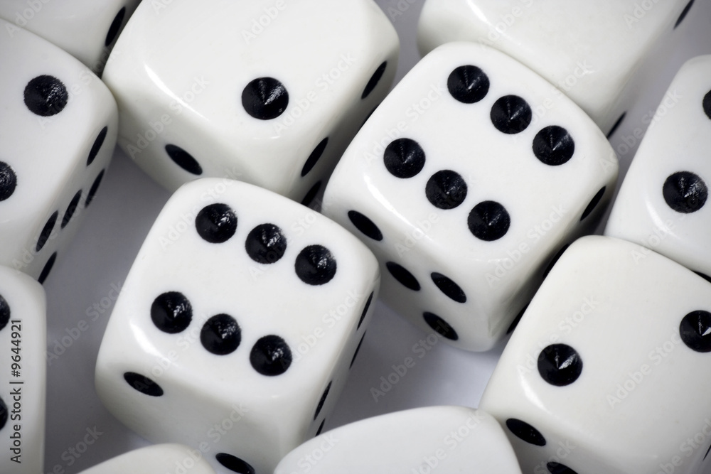 White gambling dices thrown on white background White gambling dices thrown on white background