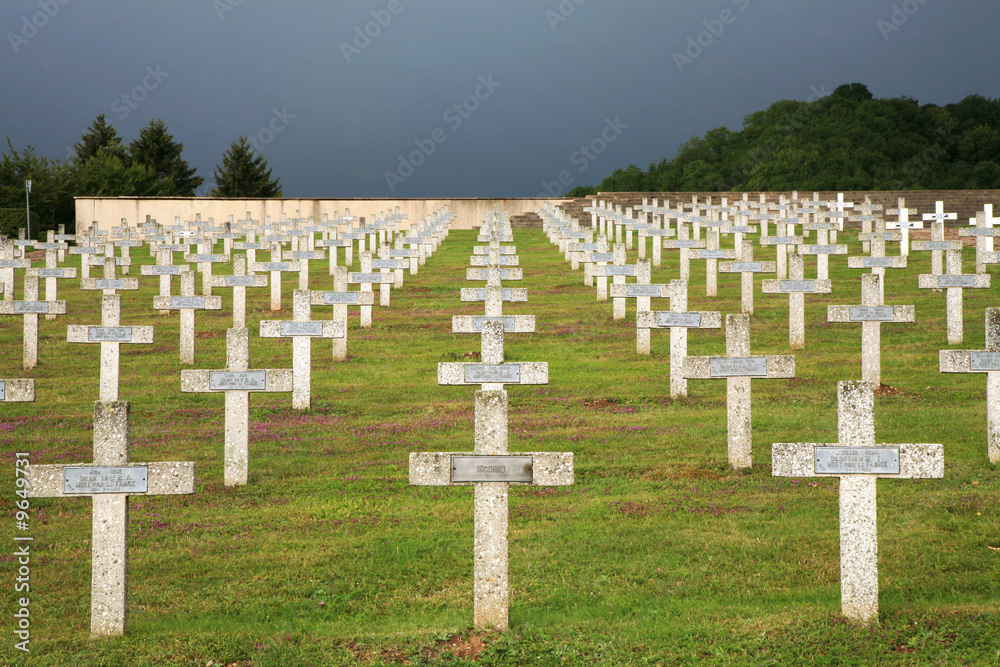 Rows of tombstones in a military graveyard