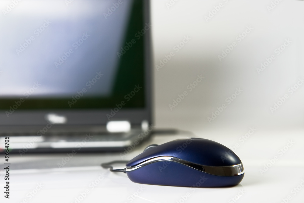 mouse and laptop on white background mouse and laptop on white background