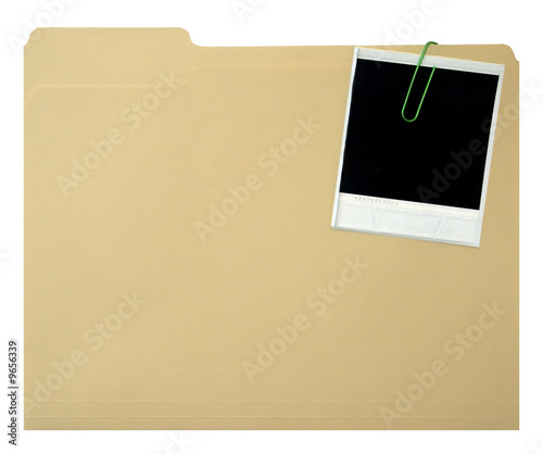 Blank instant print clipped to file folder photo