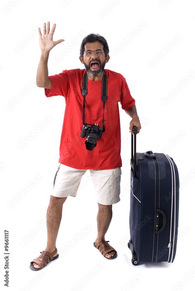 Traveler Man with the camera and luggage . Traveler Man with the camera and luggage .