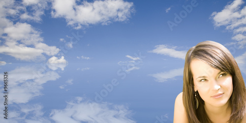 Pretty Woman On The Sky Background