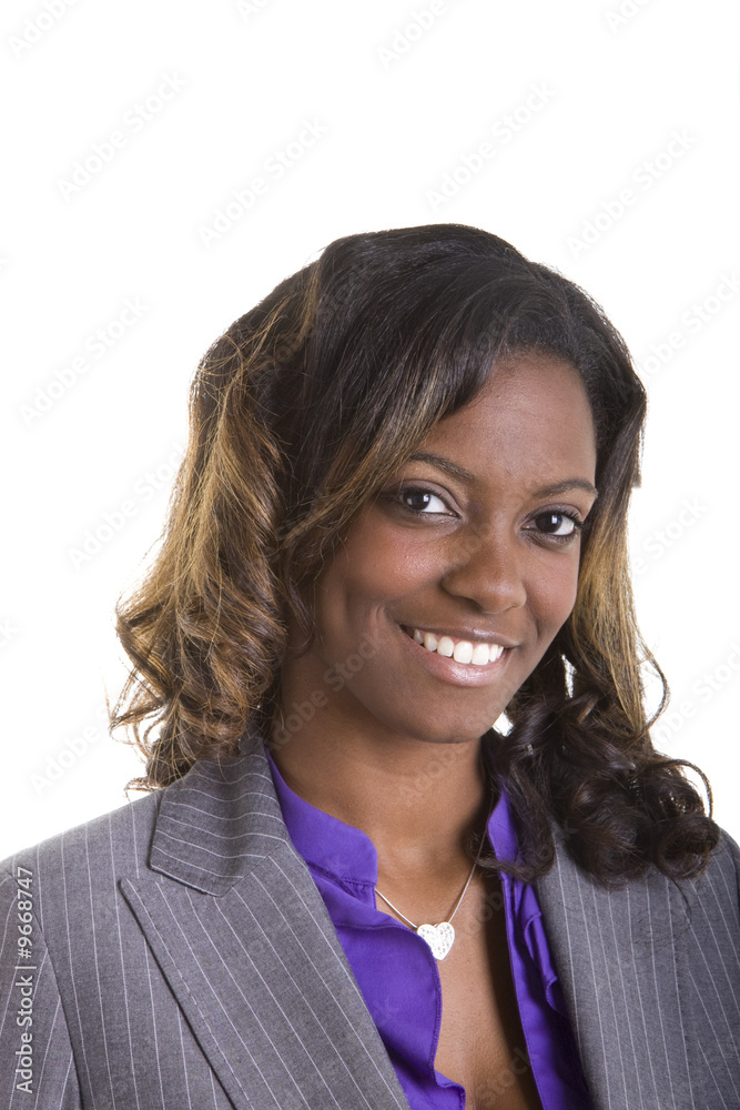 A beautiful african american businesswoman in a grey suit A beautiful african american businesswoman in a grey suit