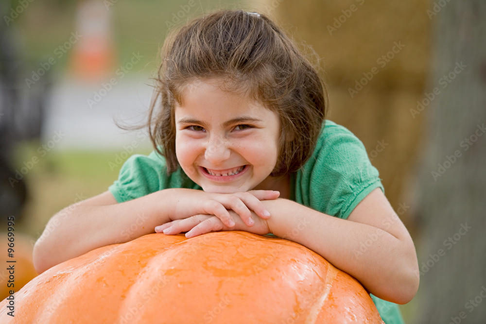 © sonya etchison - Little Girl and A Big Pumpkin © sonya etchison - Little Girl and A Big Pumpkin