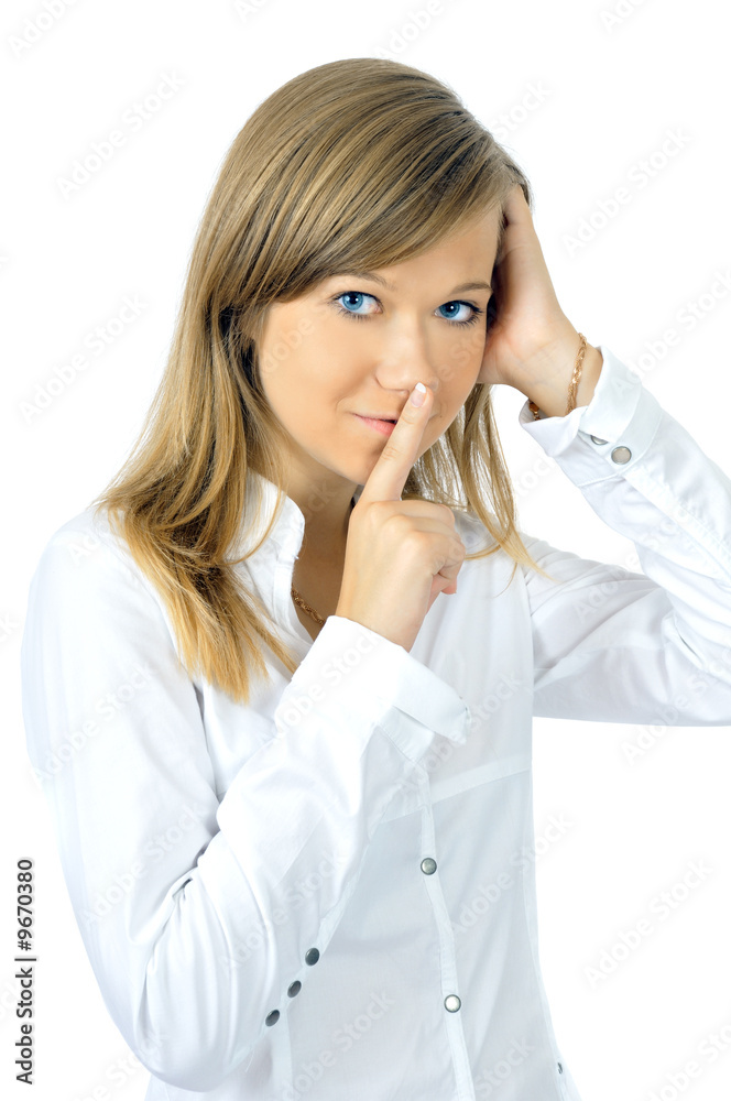 Beautiful fresh young girl shows Sh-h, isolated on white Beautiful fresh young girl shows Sh-h, isolated on white