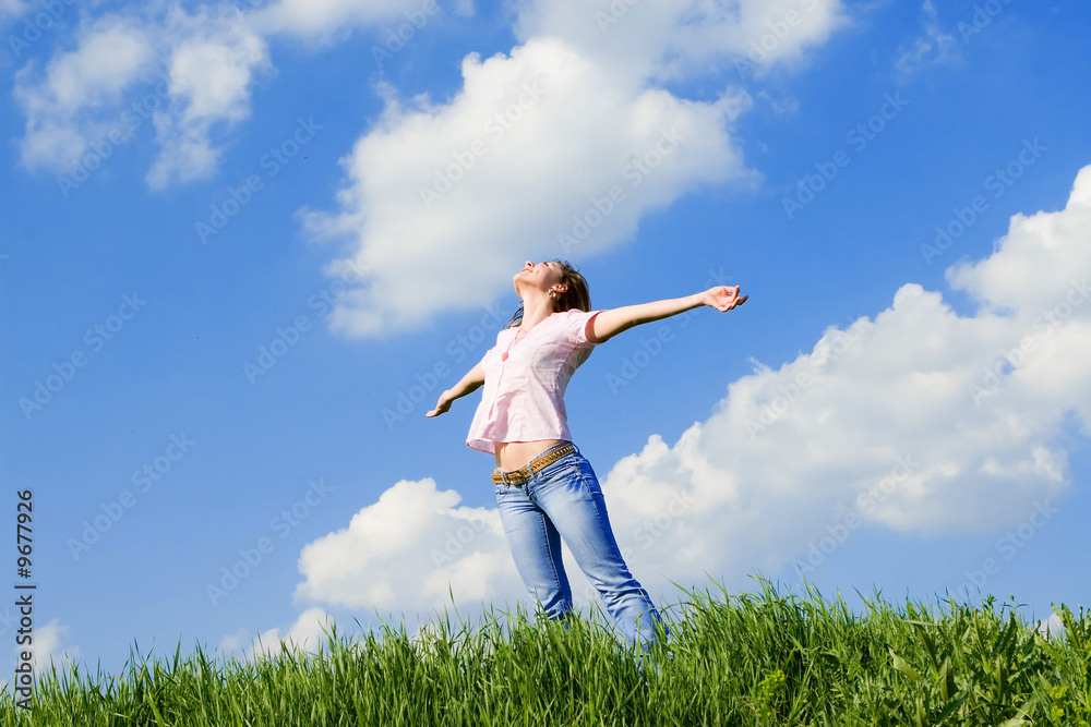happy young woman dreams to fly on winds happy young woman dreams to fly on winds