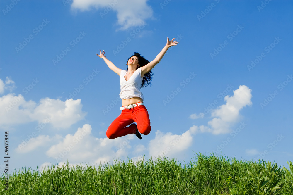 pretty young woman is jumping pretty young woman is jumping