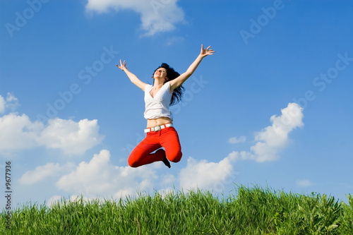 pretty young woman is jumping
