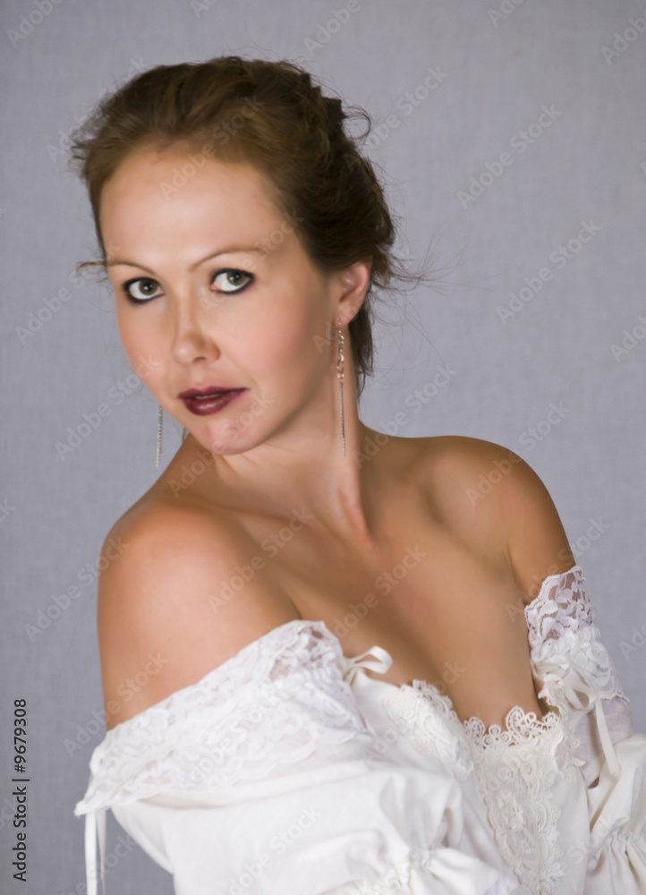A young woman with bare shoulders A young woman with bare shoulders