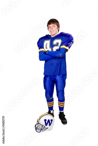 A teen football player in jersey