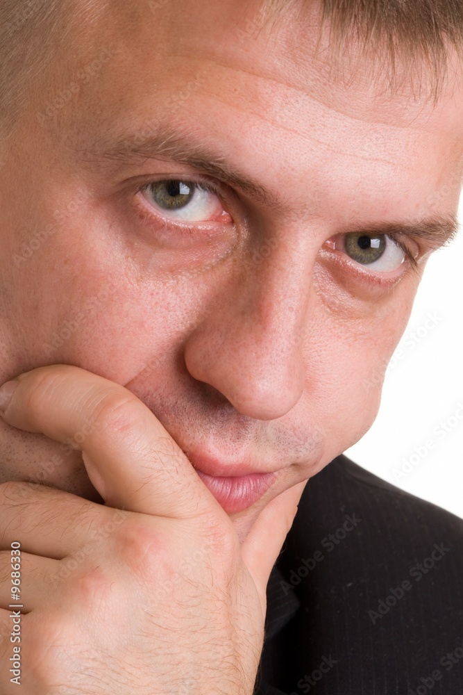 Portrait of the serious businessman close up. Portrait of the serious businessman close up.