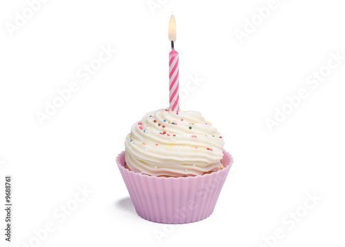Pink cupcake with candle on white background