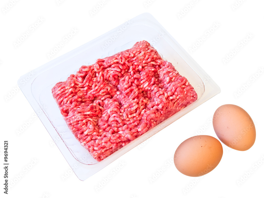 mincemeat in box and eggs against the white background mincemeat in box and eggs against the white background