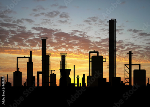 Oil refinery factory over sunrise