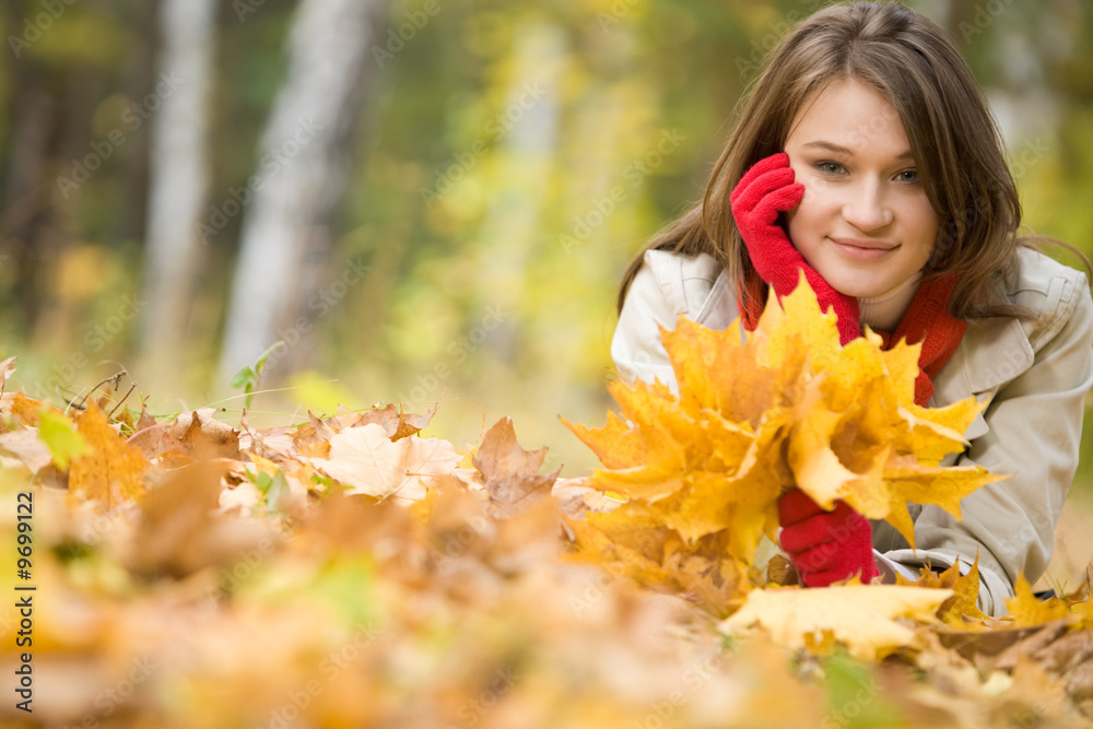Image of pretty girl lying on ground Image of pretty girl lying on ground
